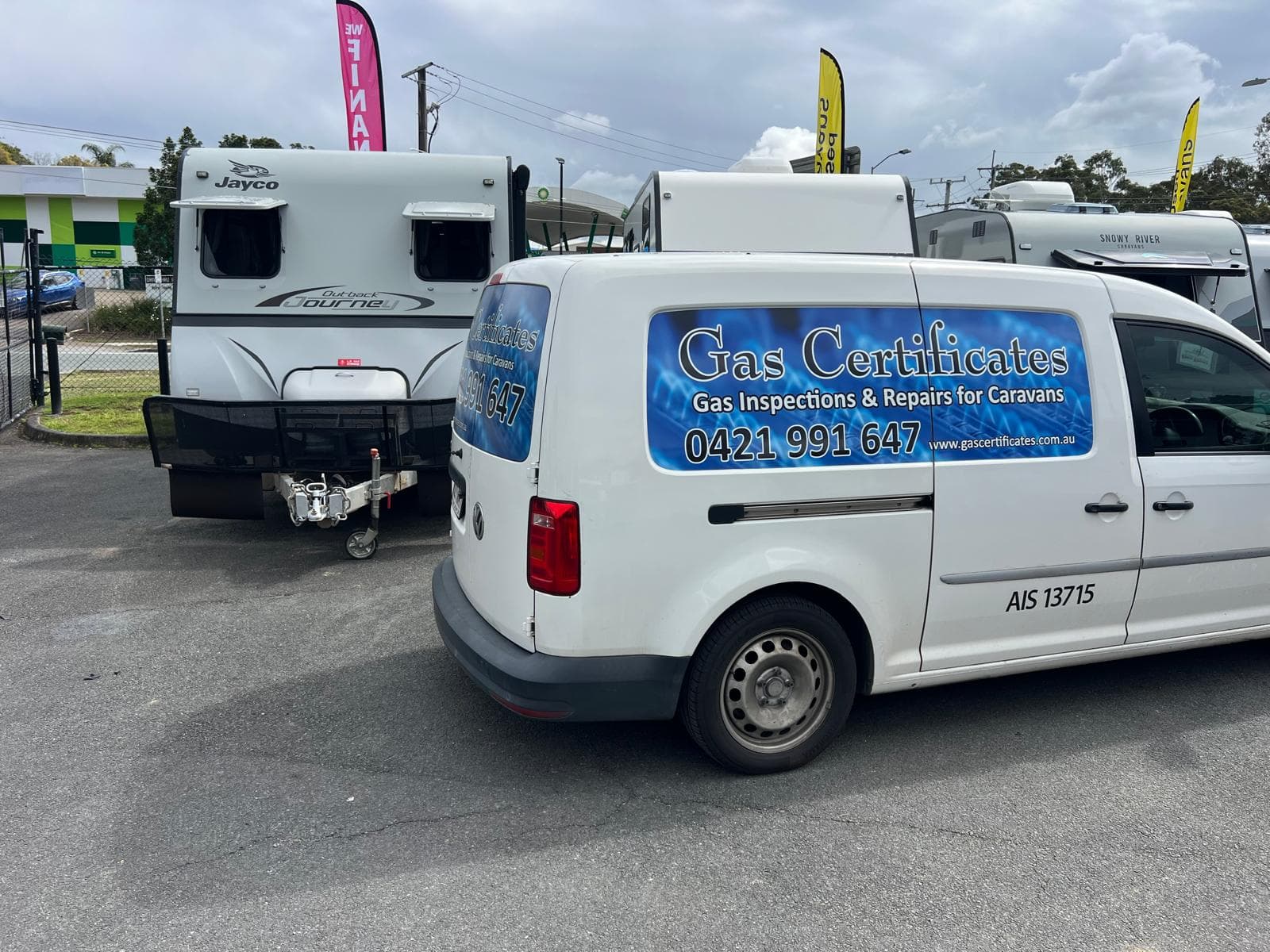 Gas Certificates mobile service van parked beside caravans, carrying out on-site gas inspections